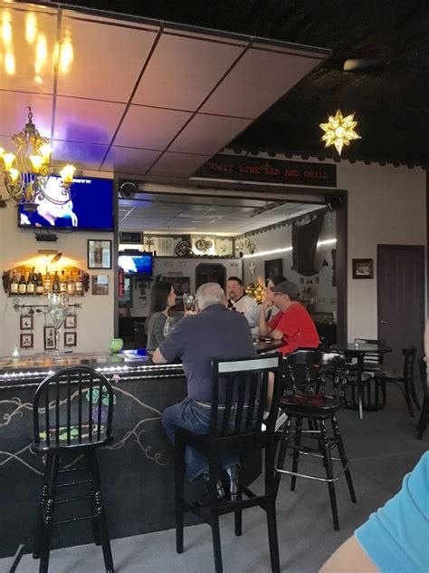 County line bar - Small country bar with attached liquor store. Pool tables, electronic darts. DJ and Karaoke on Friday nights. Pool tournament 1st Friday of each month. Steak night Bar is open Mon-Thurs from...